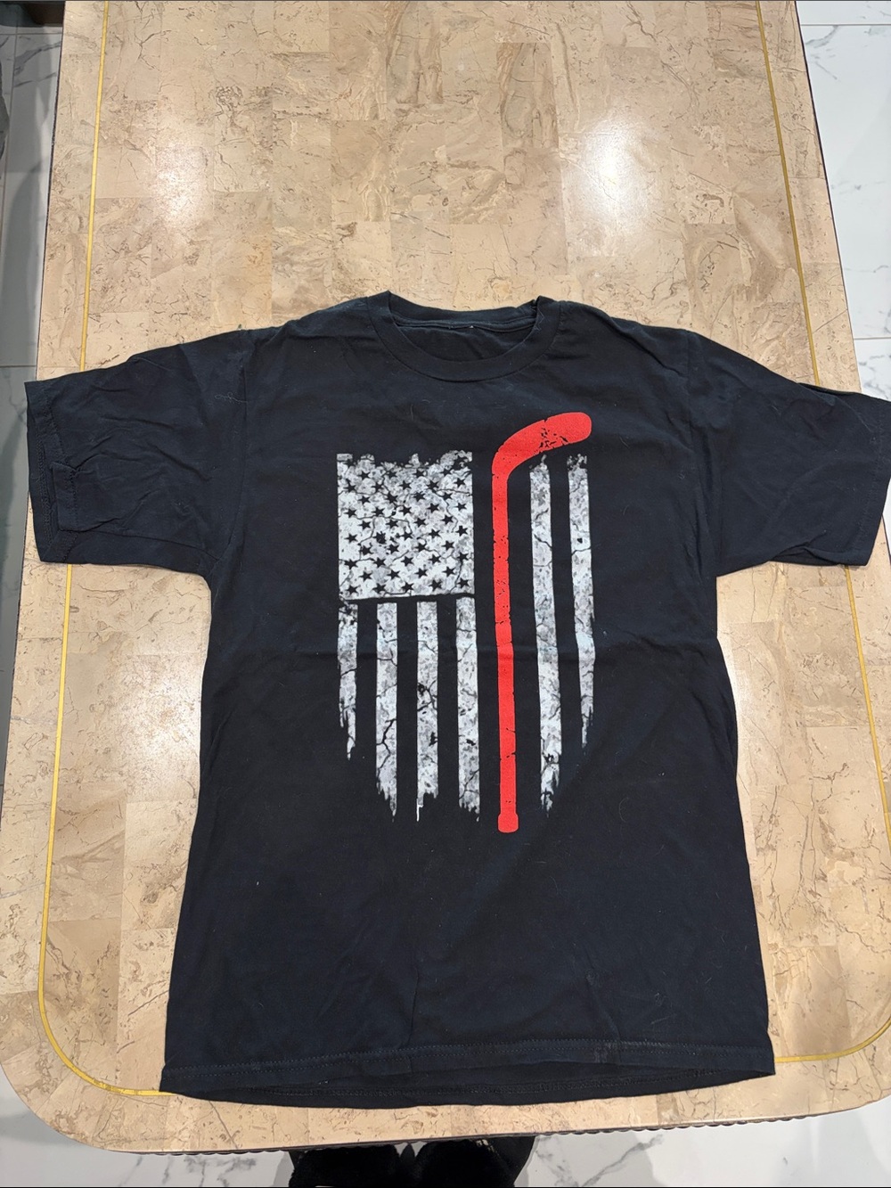 Black Short-Sleeve Graphic Tee with American Flag and Red Hockey Stick